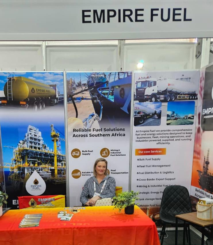 An Empire Fuel team member welcoming visitors at the exhibition stand
